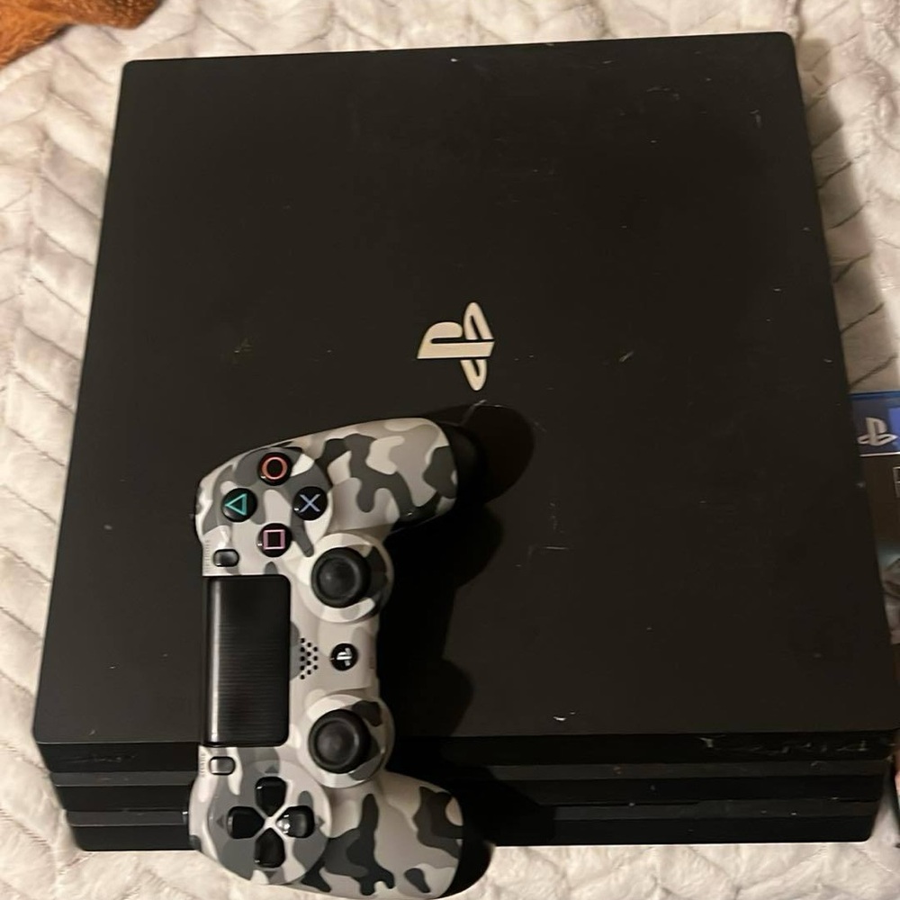 Sony Black and Gray Console with DualShock 4 Controllers